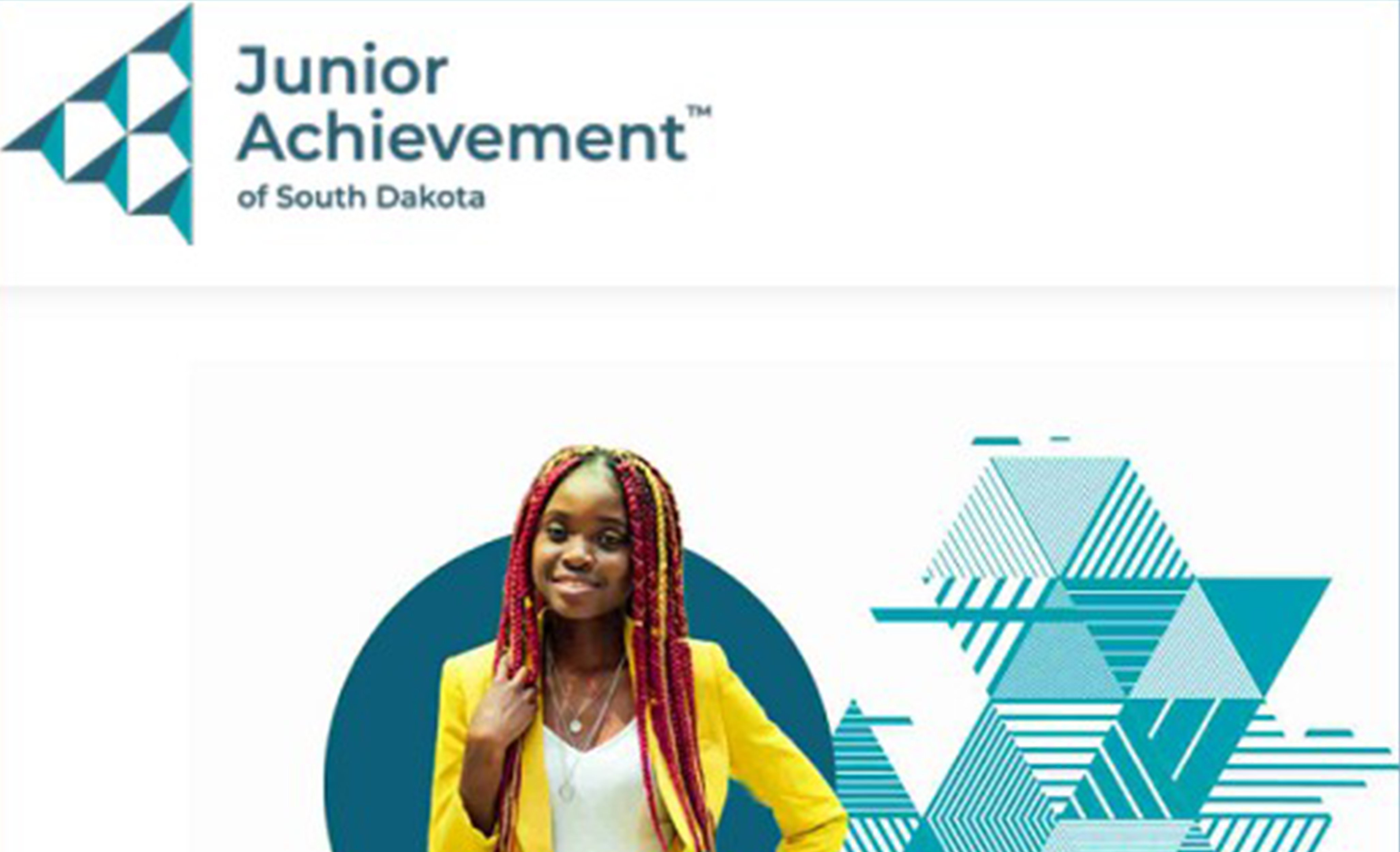 Junior Achievement logo and African American girl wearing yellow blazer